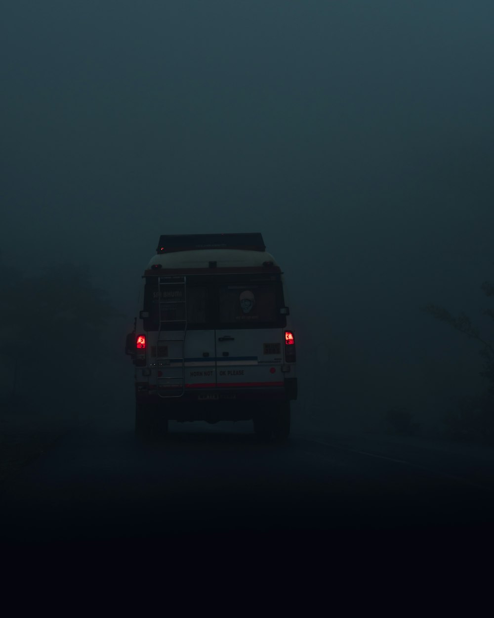 a white truck in the dark