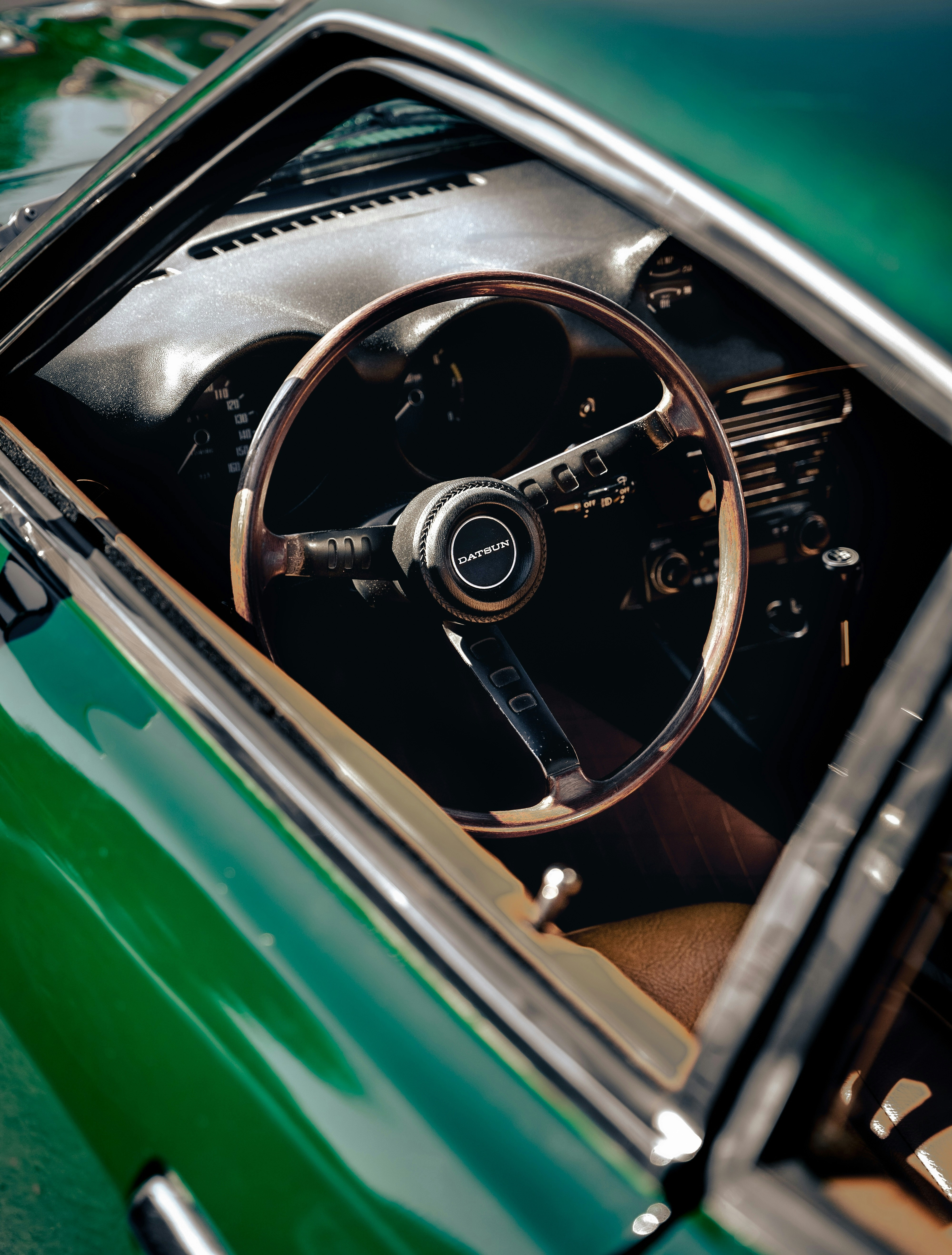 a steering wheel and dashboard of a car