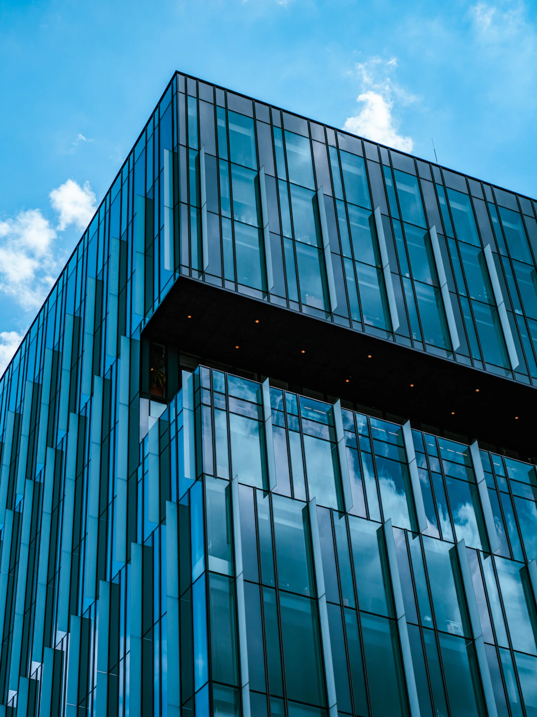 Geometric glass facade of a contemporary office building