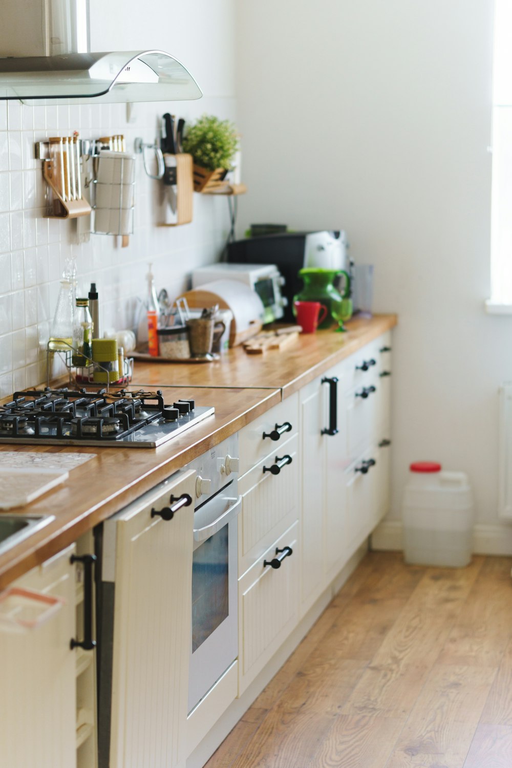 a kitchen with a stove and a sink