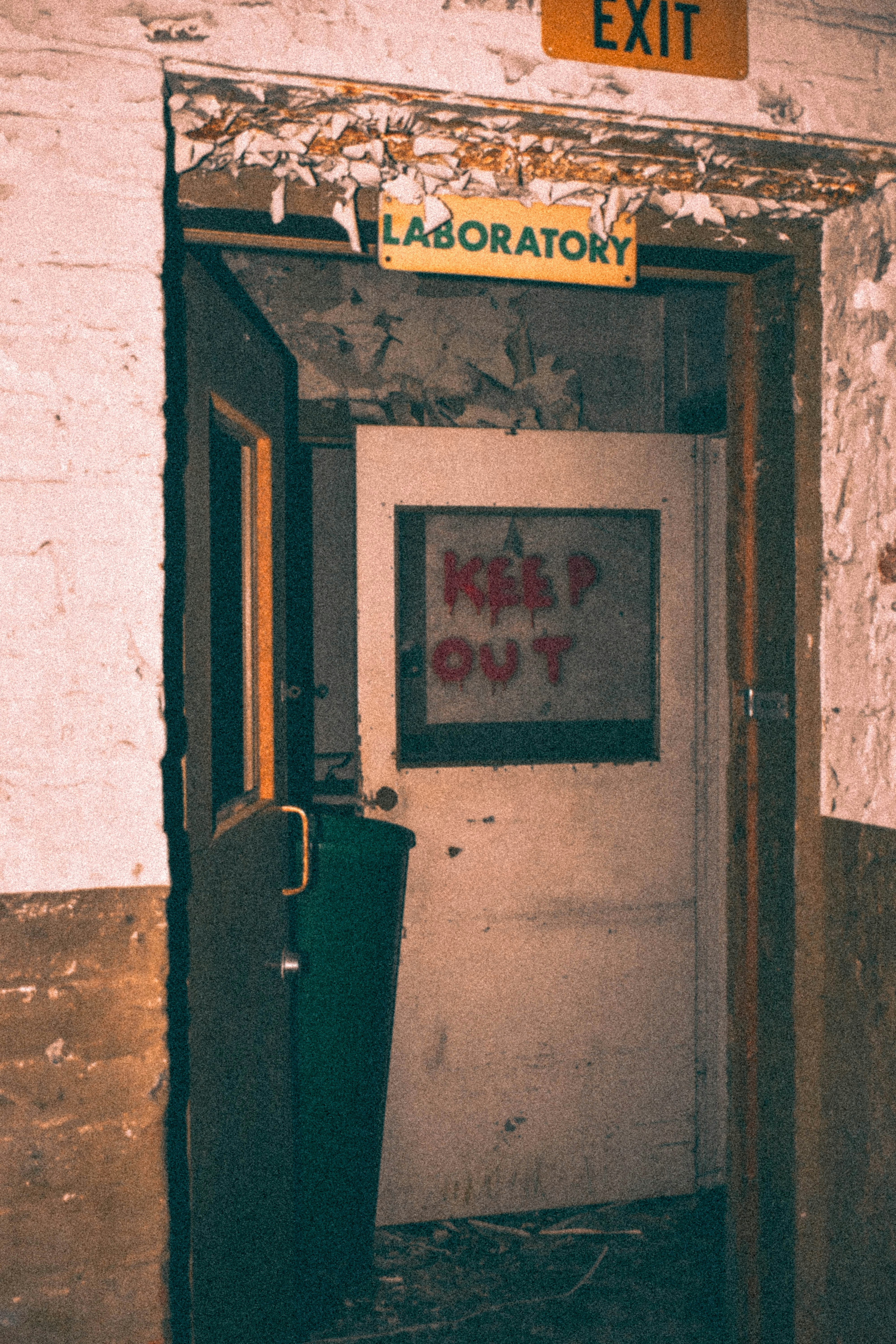 An eerily painted door saying \