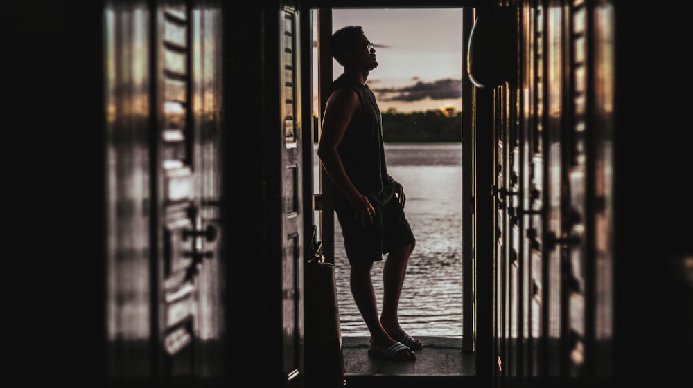 a person standing in a doorway