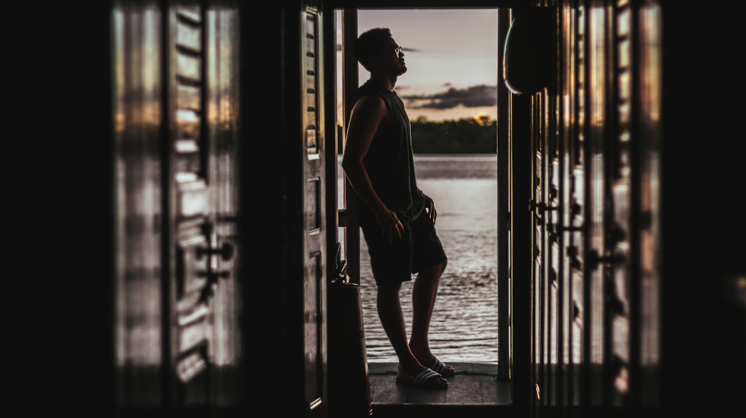 a person standing in a doorway, Amazônia