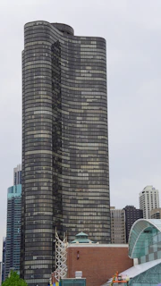 a tall building with a curved top