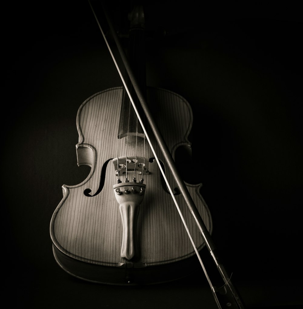 a violin with a black background