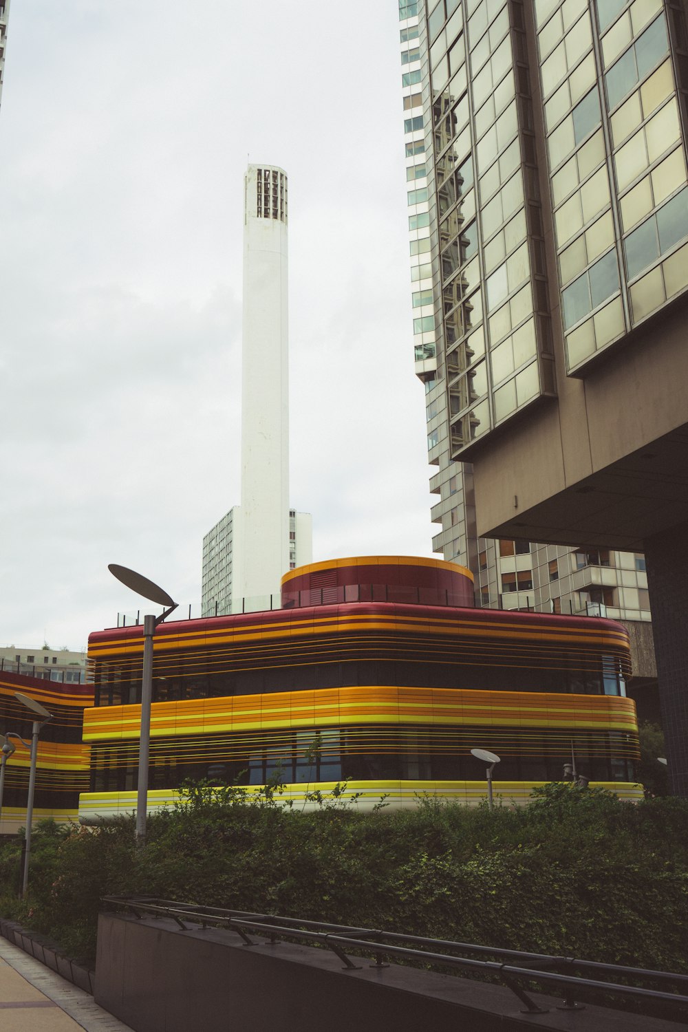 a train going by a tall building