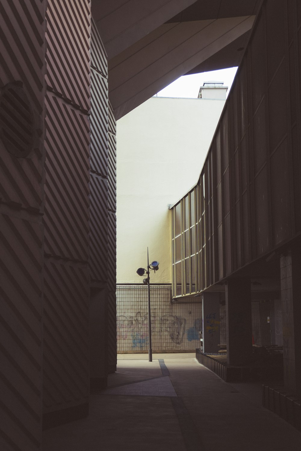 a walkway between two buildings