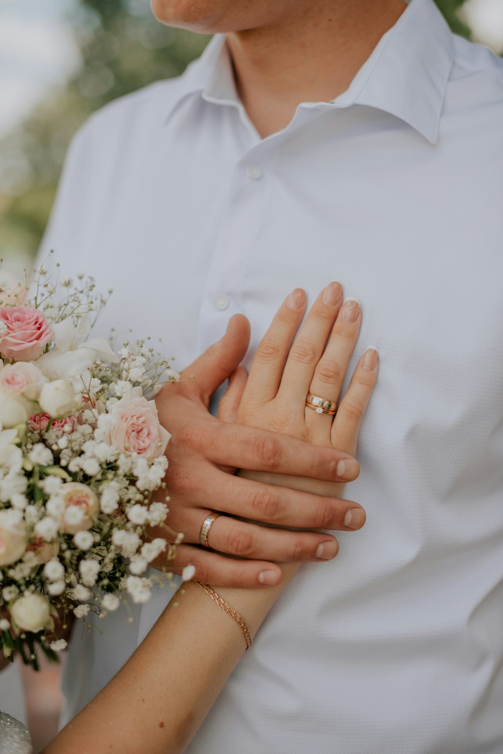 a man and woman holding hands