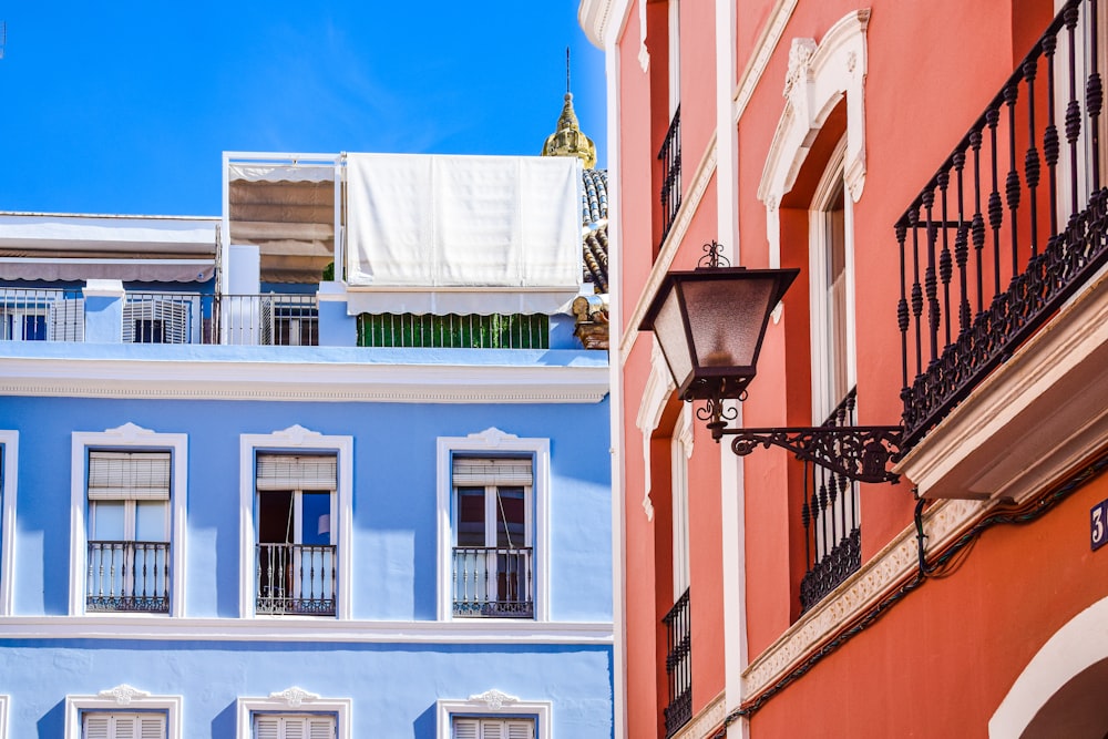 a row of buildings with a lamp post