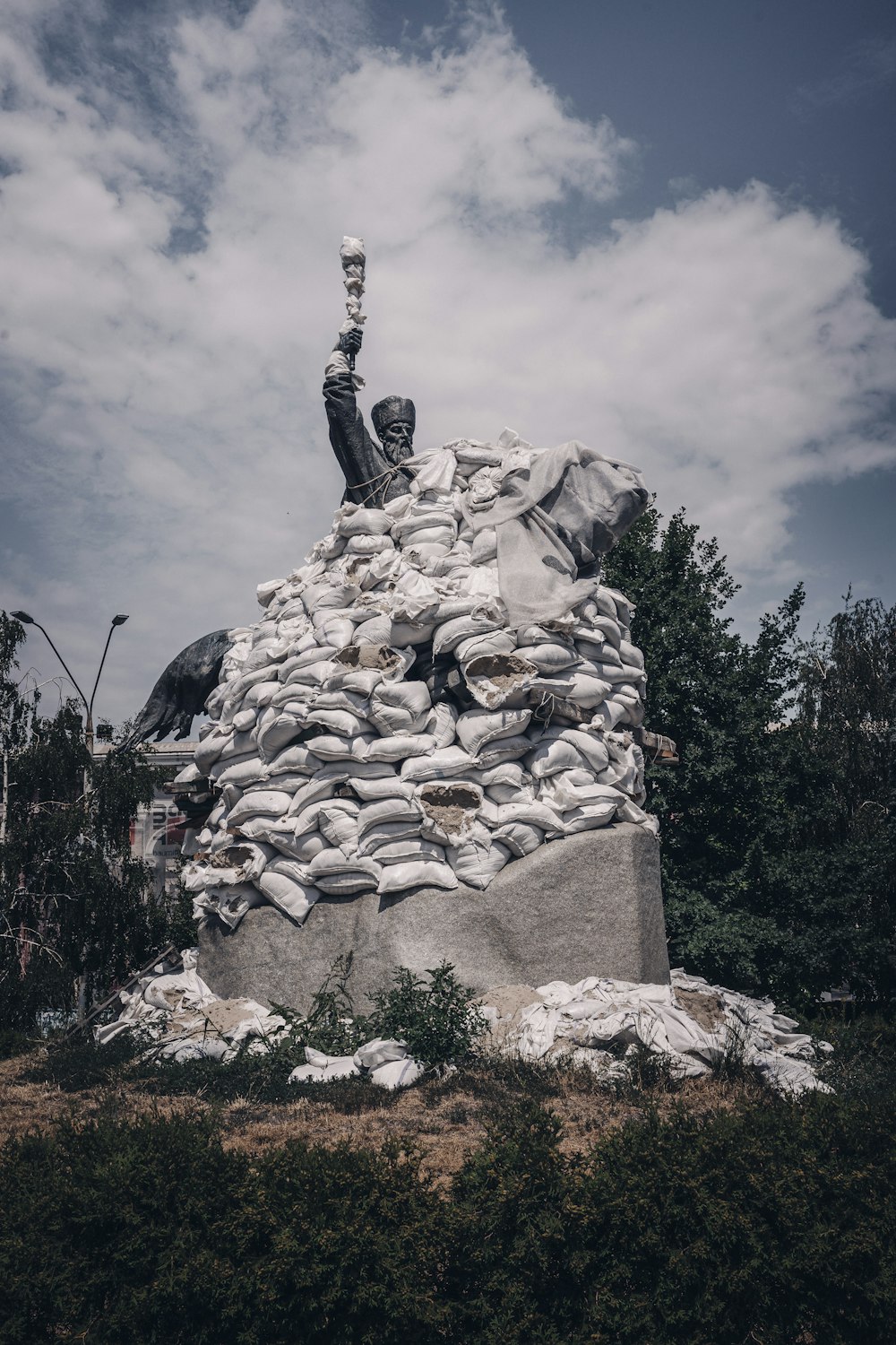 a statue on top of a rock