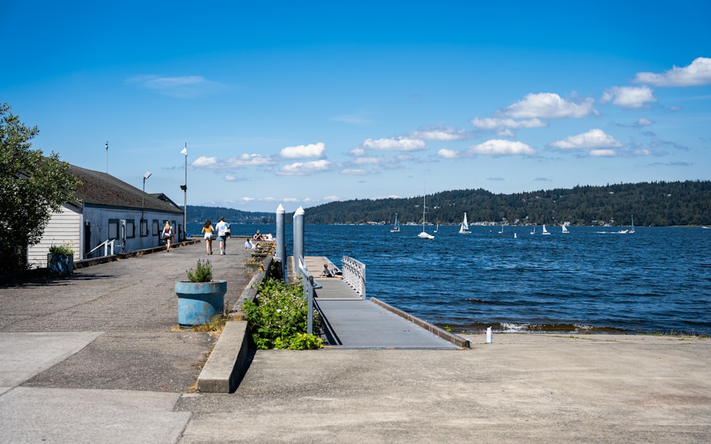 a dock with boats in the water