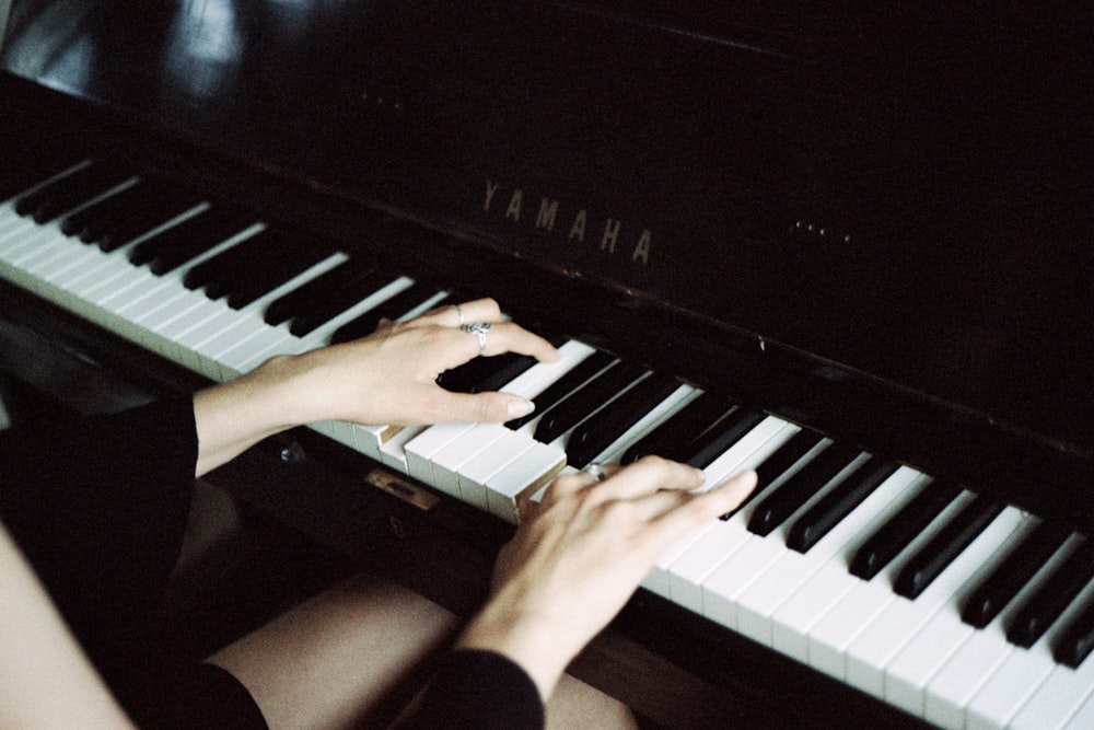 a person playing a piano