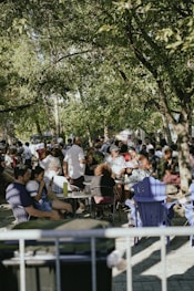 a group of people sitting at tables
