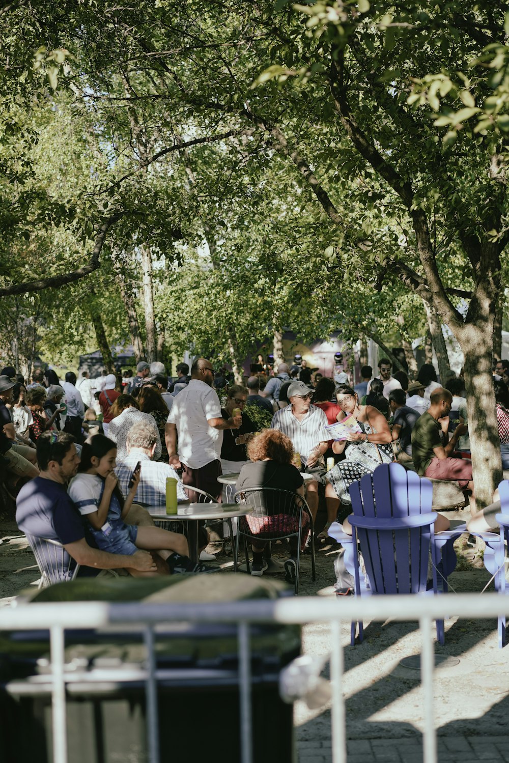 a group of people sitting at tables