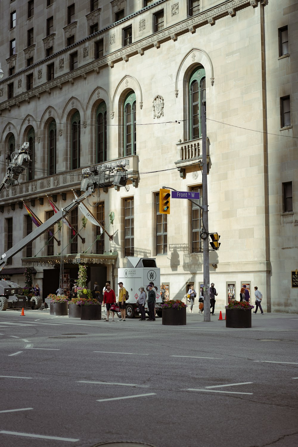 a group of people stand outside a building