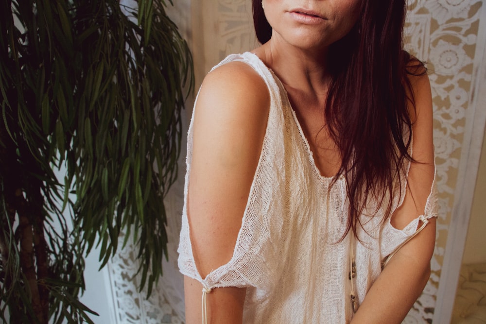 a woman wearing a white dress