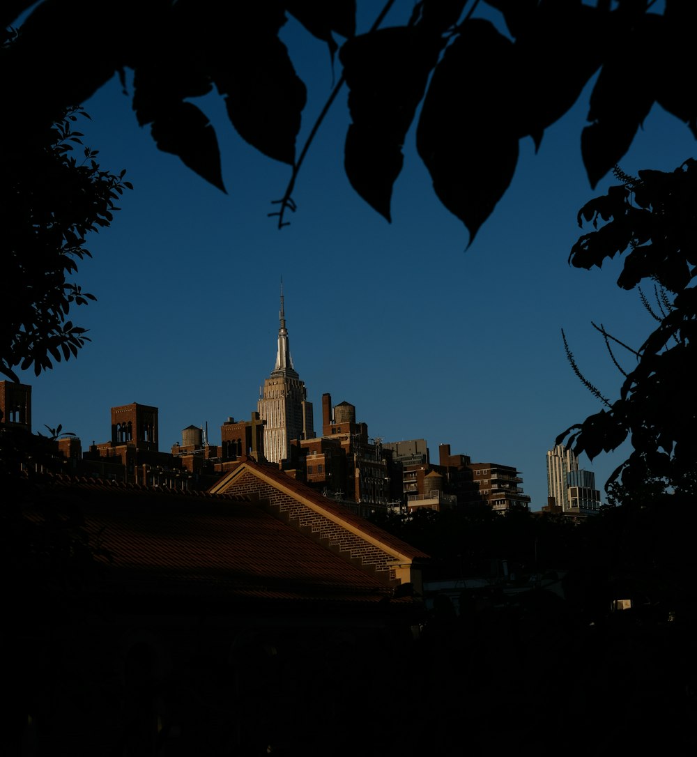 a city skyline with a blue sky