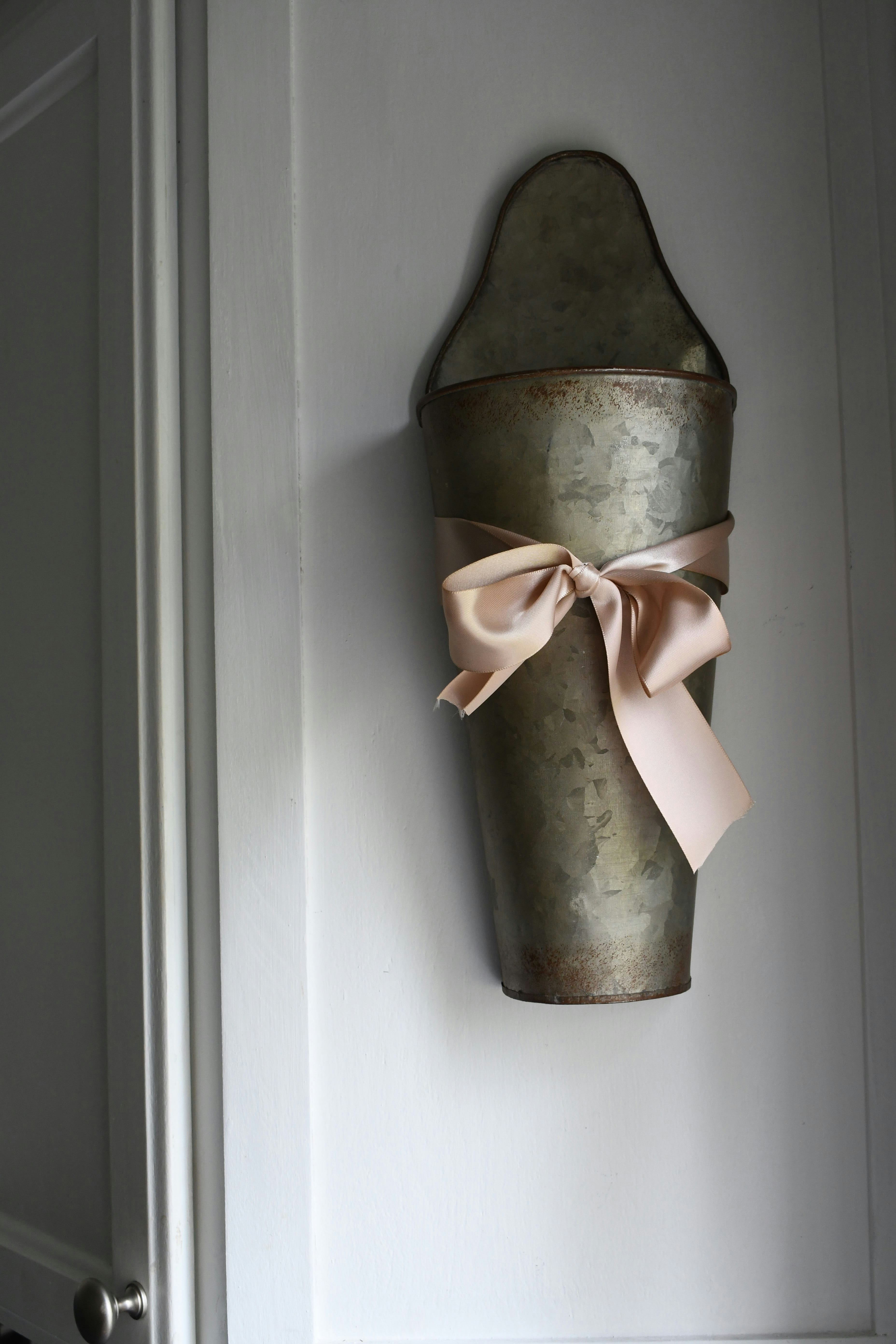 a metal object with a bow