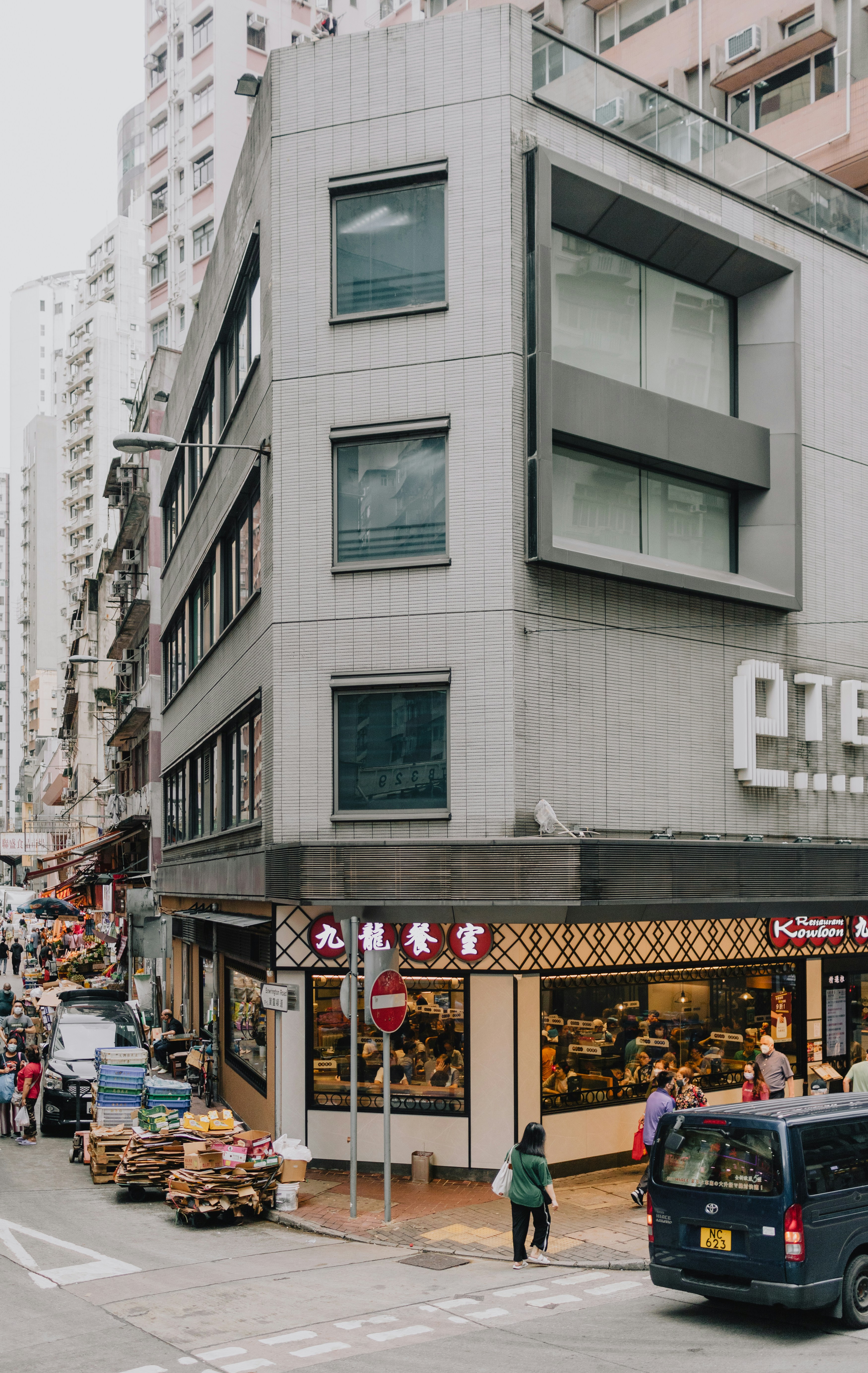 A street with a storefront photo – Free Person Image on Unsplash