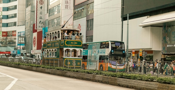 a bus travels down the street