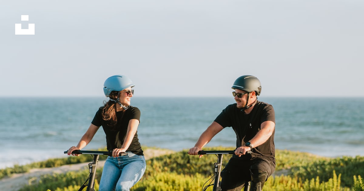 Two people riding bikes photo – Free Bike Image on Unsplash