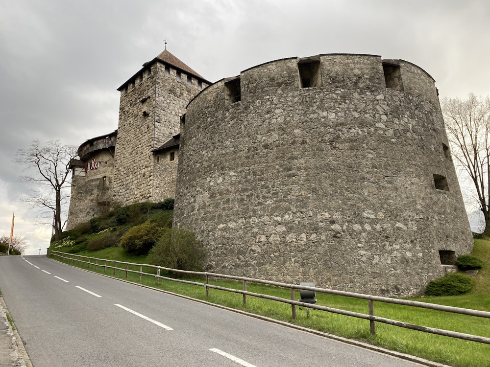 a stone castle on a hill