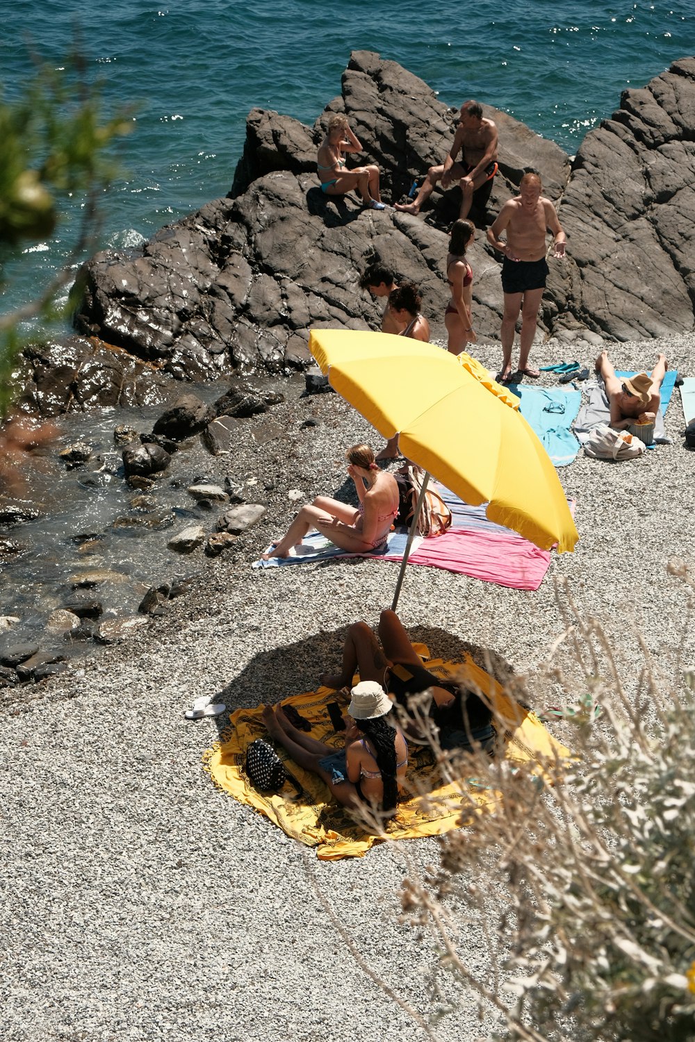 a group of people on a beach