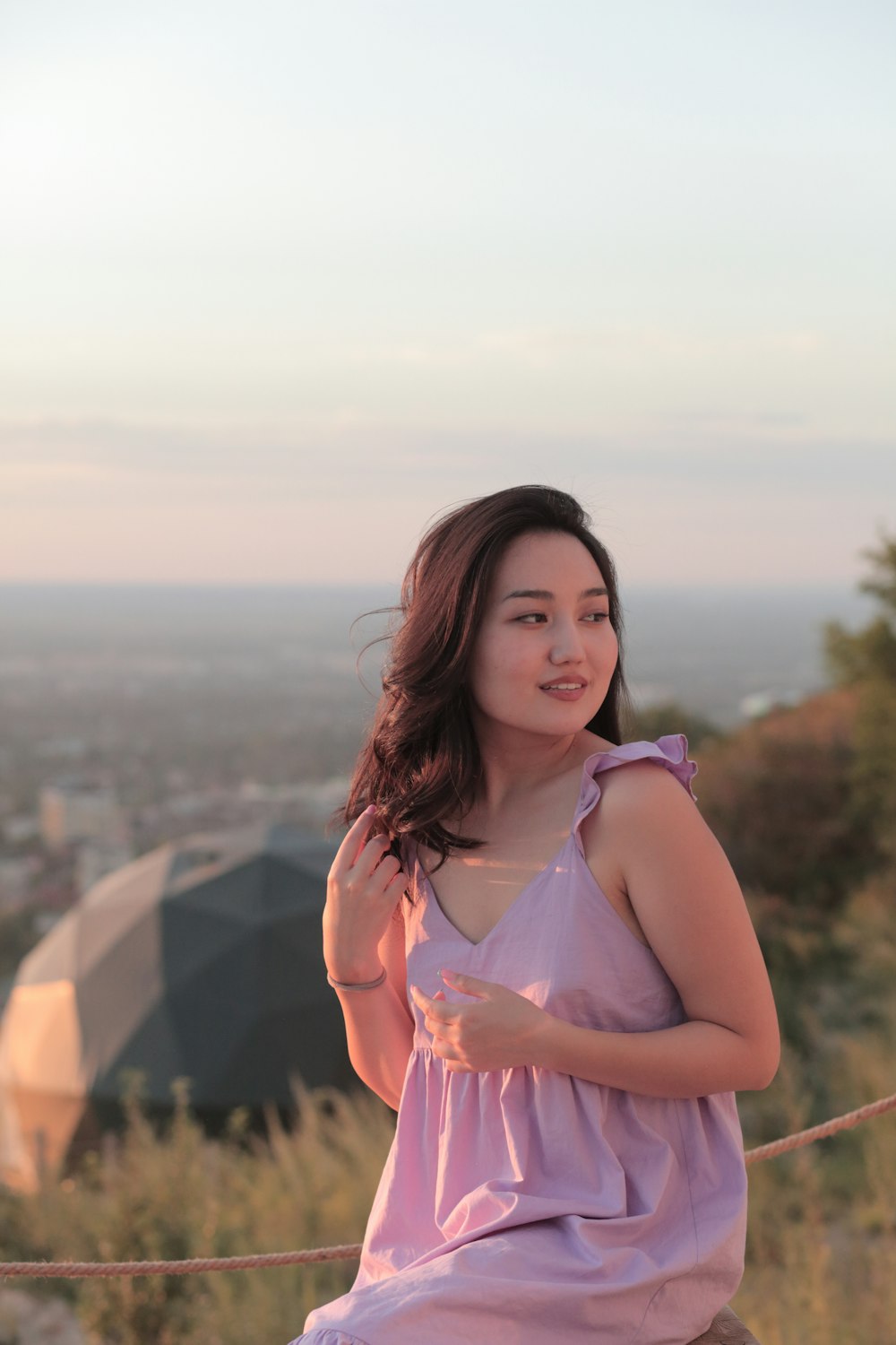 a woman in a pink dress