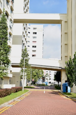 a brick walkway between buildings