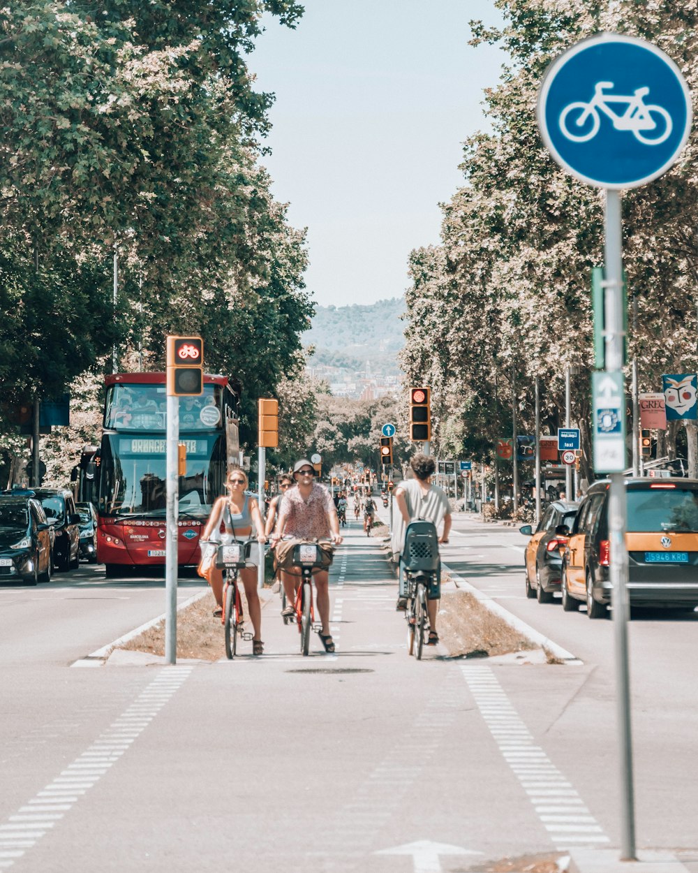 bicyclists going down the street