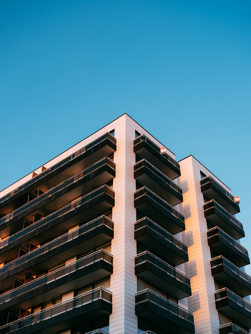 a tall building with balconies