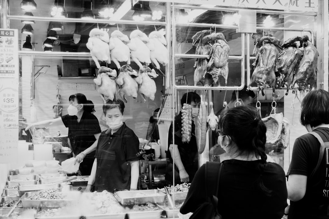 a group of people in a store,