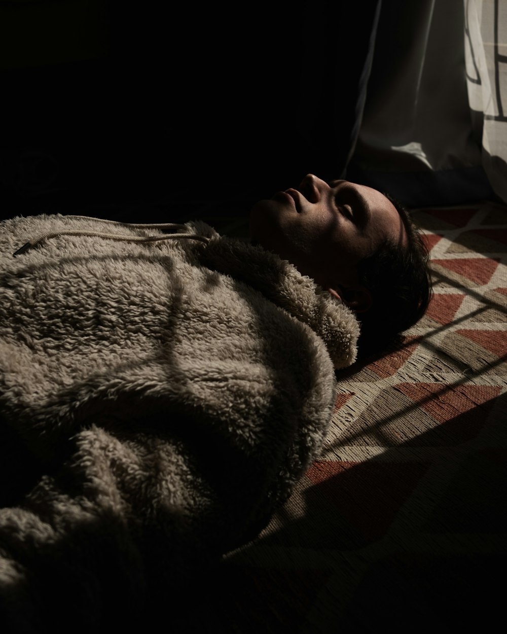 a person sleeping on a bed
