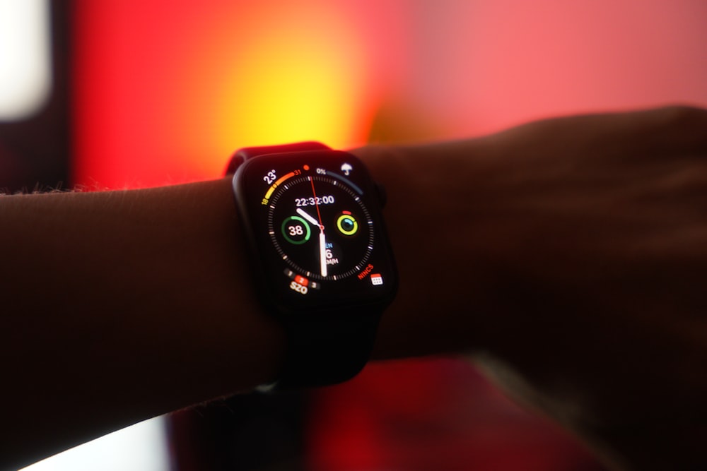 a wrist with a digital watch