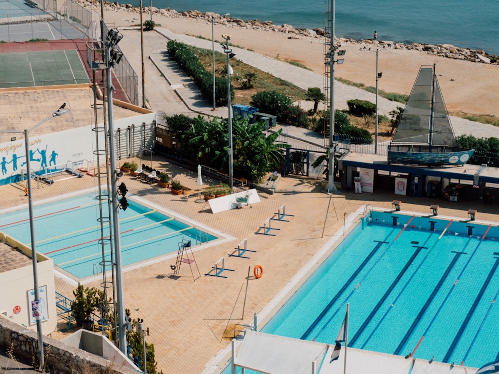 a swimming pool next to a beach