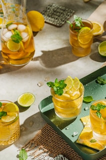 a group of lemons in glasses