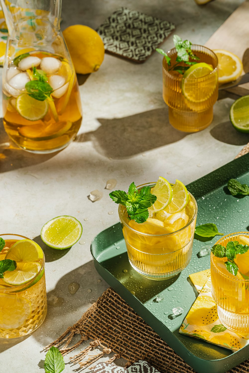 a group of lemons in glasses