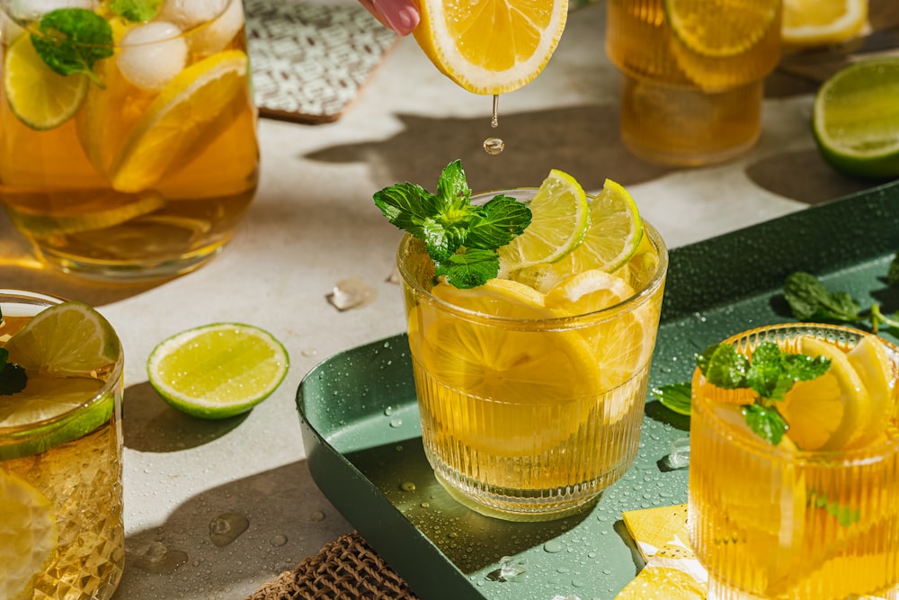 a group of glasses with liquid in them