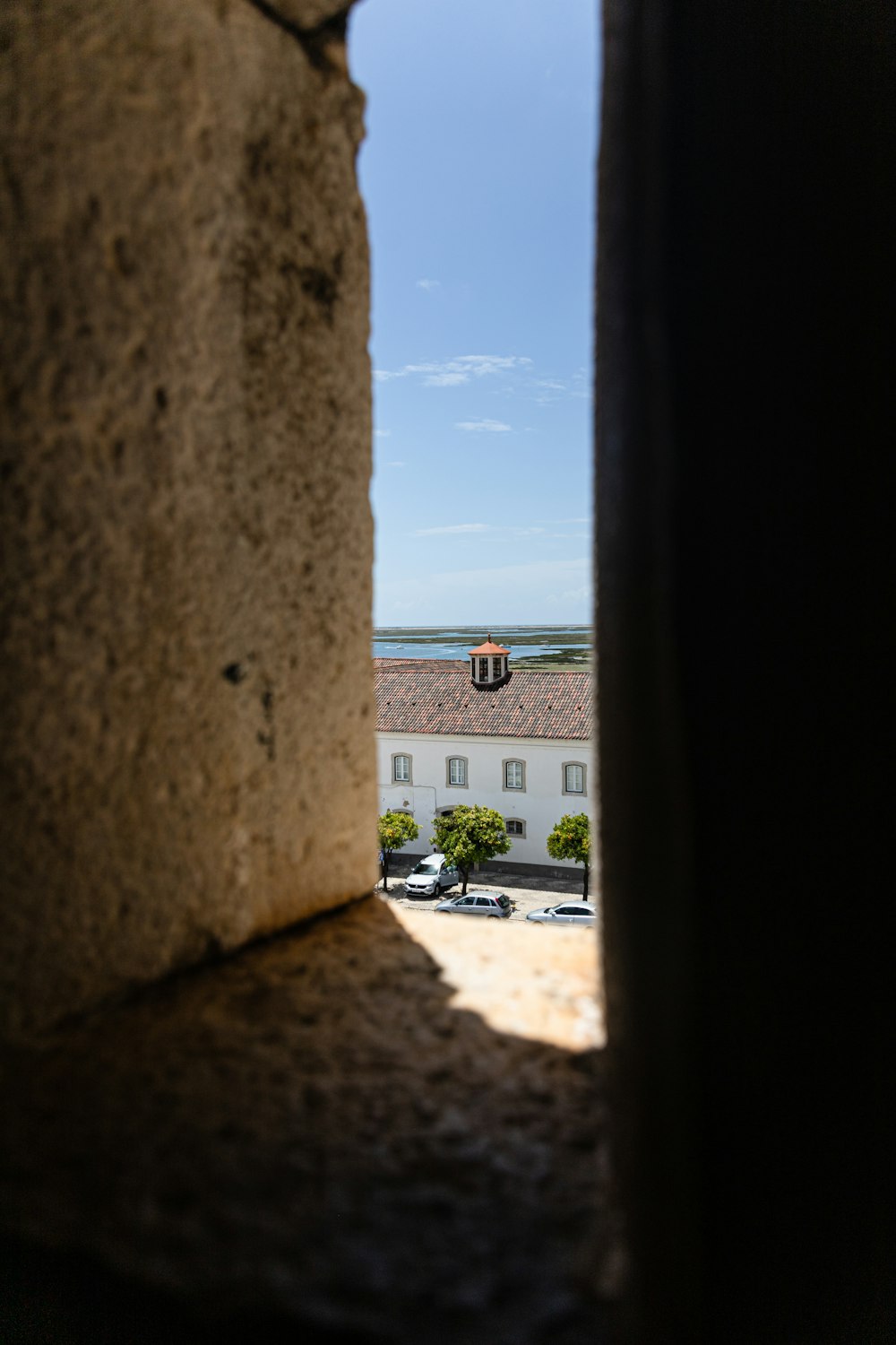 a view of a street through a window