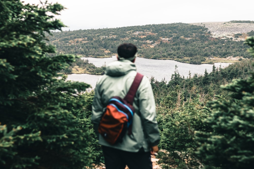 a man looking at a river