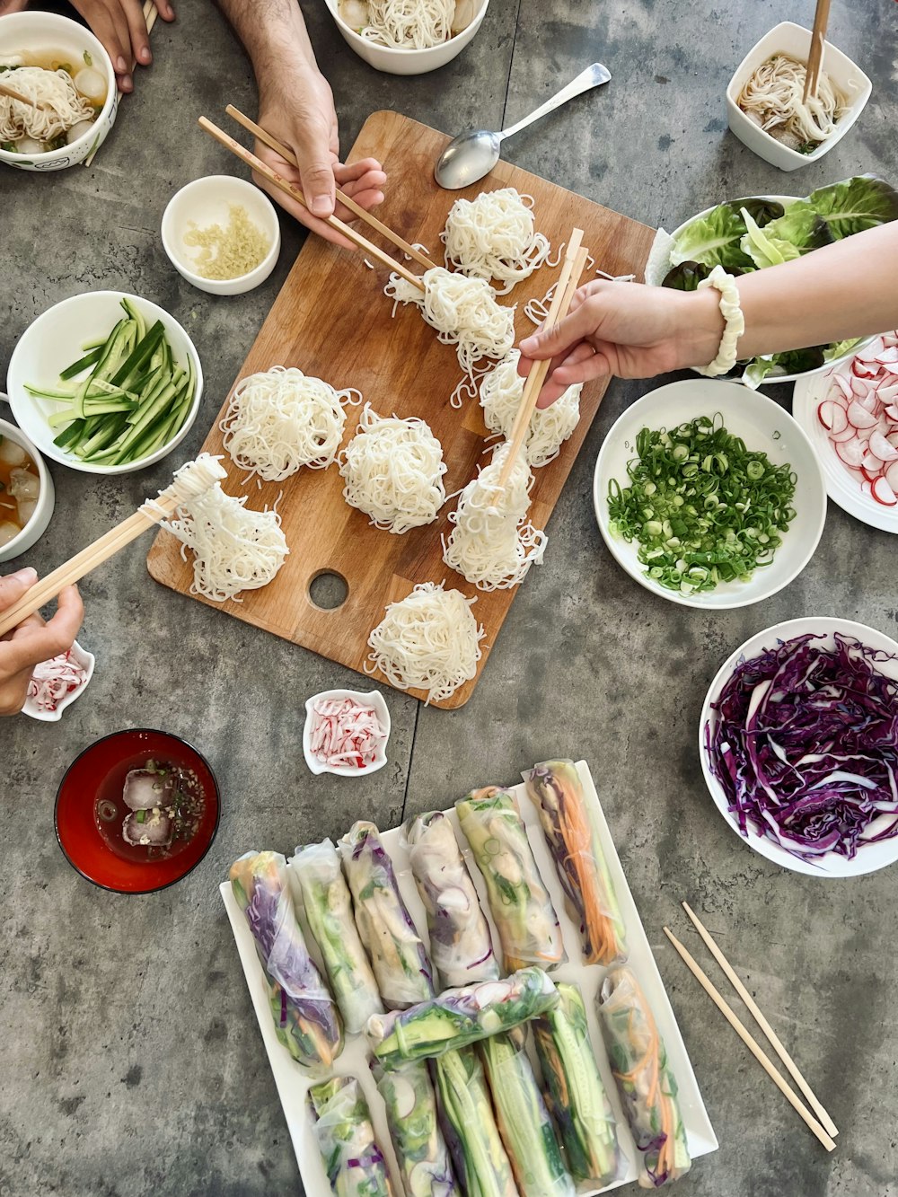 a group of people preparing food