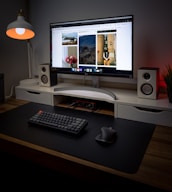 A modern desktop setup featuring a high-resolution monitor and ergonomic mouse.