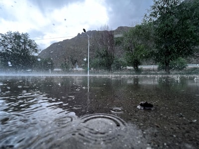 Heavy rain falling on a street in Starnberg during a local thunderstorm