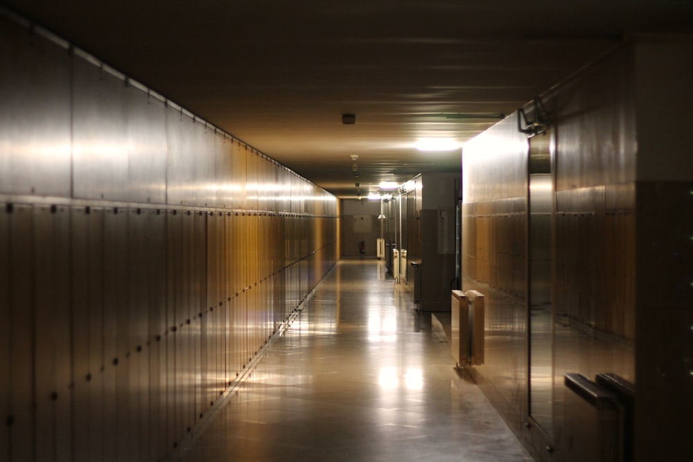 a long hallway with metal doors