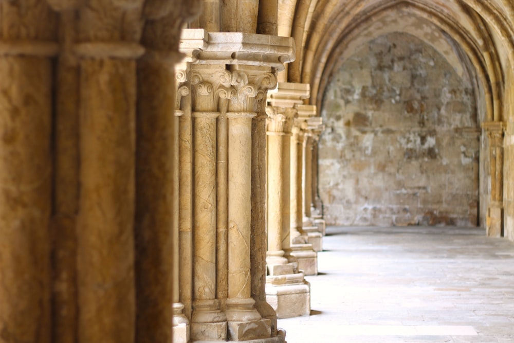 a hallway with pillars