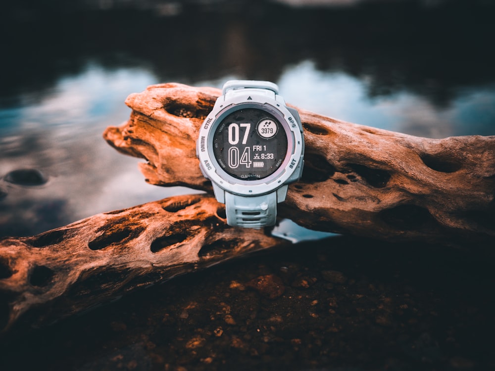 a watch on a rock