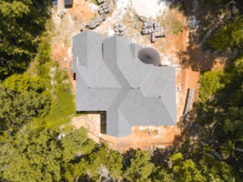 a large stone building surrounded by trees