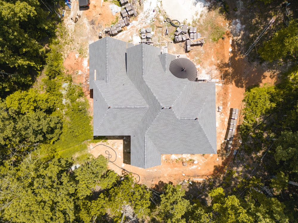 a large stone building surrounded by trees