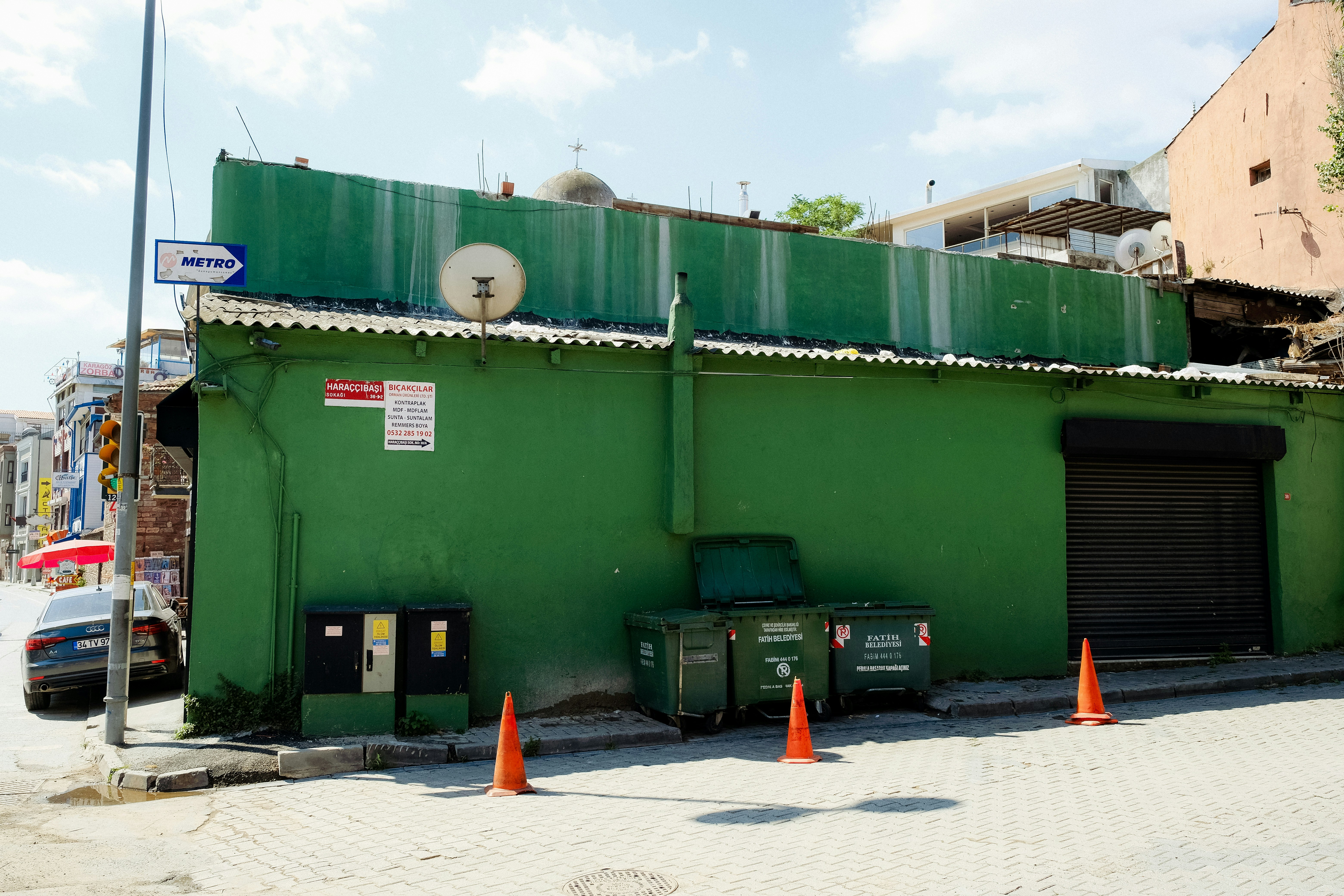 a green building with a green roof