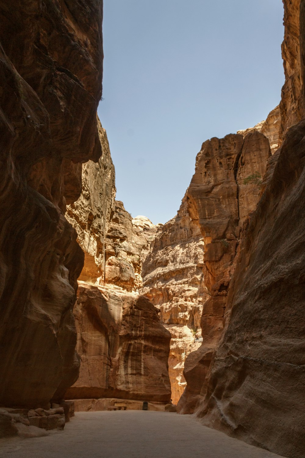 a road between large rocks